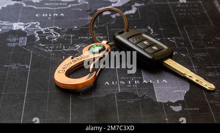 black car key over black map Stock Photo - Alamy