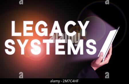 Sign displaying Legacy Systems. Word Written on old method technology computer system or application program Stock Photo
