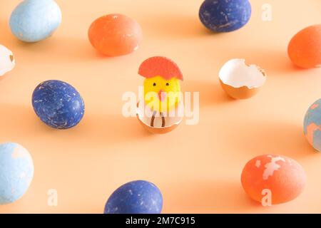 Diy easter chicken in eggshell. concept. beige background. layout. Stock Photo