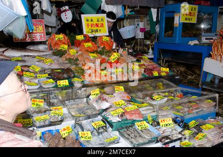 Tokyo, December 14, 2017: Fish and seafood store in Tsukiji Market. Honshu. Japan. Stock Photo