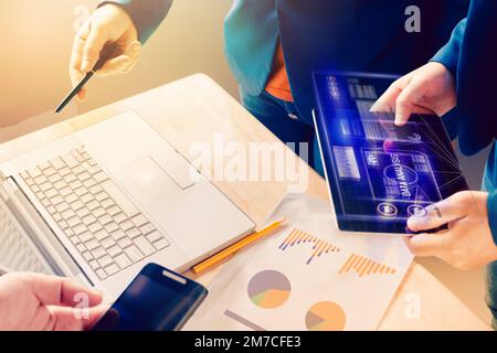 Team work process. Marketing with Hologram brainstorming and Data Analysis. start up team meeting. technology for business. Intentional sun glare. Stock Photo