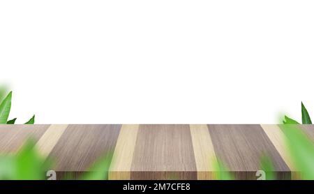 Empty wood plank table top Green mango leaf for-ground with white background. Mock up for display of product, Mock up for advertise on social media, S Stock Photo
