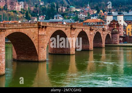 Lovely close-up view of the arch bridge Karl-Theodor-Brücke with its gate and two towers over the Neckar river in Heidelberg, Germany. It is also know Stock Photo