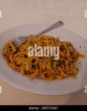 Italian food, homemade pasta with mushrooms Stock Photo