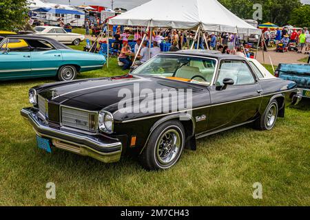 Iola, WI - July 07, 2022: High perspective front corner view of a 1975 Oldsmobile Cutlass Salon 2 Door Hardtop at a local car show. Stock Photo