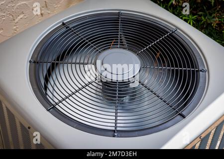 Modern residential HVAC air conditioner unit fan top view. Stock Photo