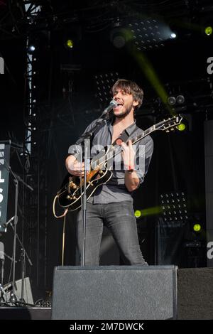 Singer and guitarist of the rock band Storm Orchestra on stage Stock Photo