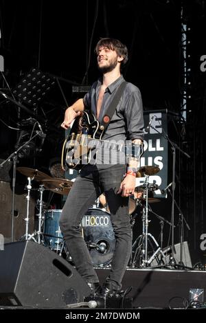 Singer and guitarist of the rock band Storm Orchestra on stage Stock Photo