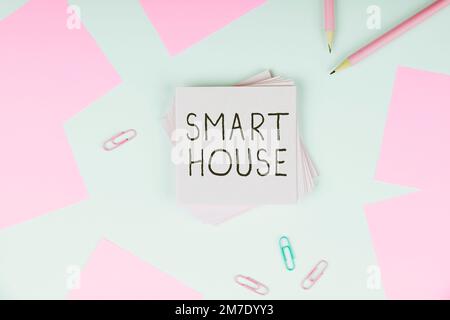 Conceptual display Smart House. Business idea homes that have electronic devices and controlled remotely Stock Photo