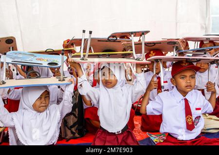 Cianjur, West Java, Indonesia. 9th Jan, 2023. Students attend school in a makeshift tent classroom during the first day of school in Cianjur. A total of 262 students at SDN Citamiang Cianjur studied in makeshift tents due to their schools being damaged by the M 5.6 earthquake. (Credit Image: © Algi Febri Sugita/ZUMA Press Wire) Stock Photo