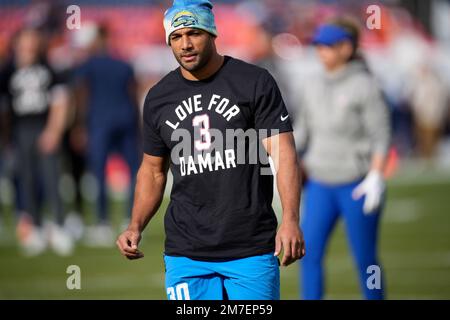 Denver Broncos safety Caden Sterns wears a T-shirt in a show of support for  Buffalo Bills safety Damar Hamlin during the first half of an NFL football  game in Denver, Sunday, Jan.