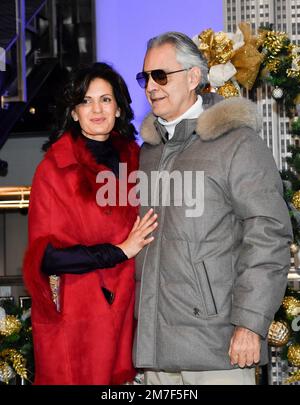 Singer Andrea Bocelli, third from left, his wife Veronica Berti, sons Amos  Bocelli, left, Matteo Botecci, third from right, daughter Virginia Bocelli  and his mother Edi Bocelli, right, arrive at the Latin