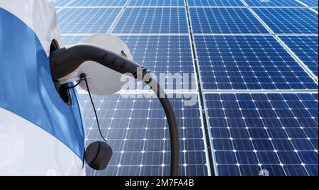 Close up of electric car with a connected charging cable on the background of solar panels Stock Photo