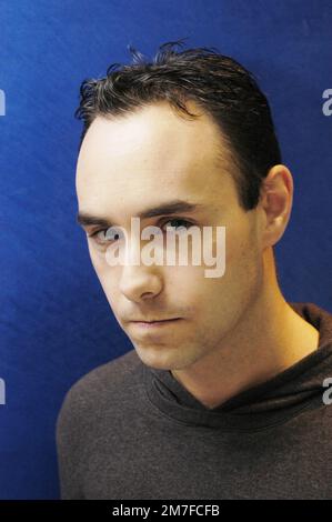 BB ALED, PORTRAIT, 2003: Chris Moyles show regular on Radio One and TV presenter BB Aled at the Steam Bar in Cardiff Hilton on 23 October 2003. Photograph: ROB WATKINS.   INFO: BB Aled, also known as Aled Haydn Jones, is a Welsh radio presenter and media personality. Best known for his work on BBC Radio 1, he gained popularity as a producer and presenter on "The Chris Moyles Show." Stock Photo