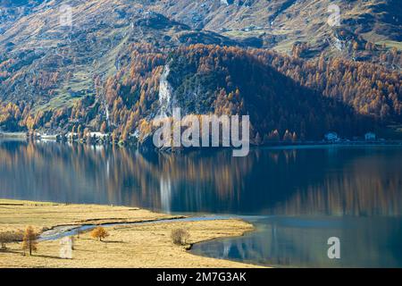 Beautiful view of the village of La Punt Chamues-ch in Engadin, Switzerland on a sunny day at the end of October Stock Photo