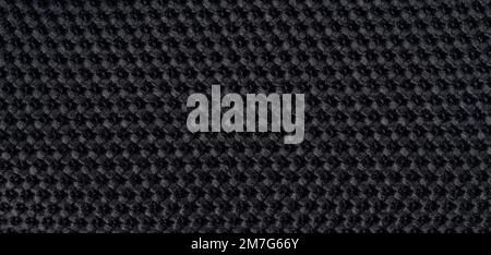 Black fabric texture knit background macro close up view Stock Photo