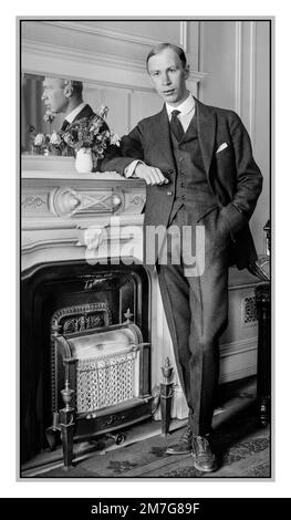 PROKOFIEV Russian composer Sergei Prokofiev (1891-1953) Date circa 1918 Informal portrait full length posing by fireplace in his home Stock Photo