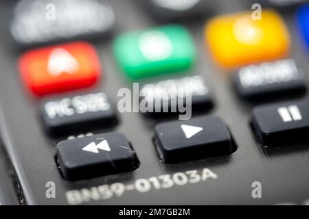 Close-up of the play button of a TV remote control Stock Photo