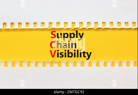 SCV supply chain visibility symbol. Concept words SCV supply chain visibility on white paper on a beautiful yellow background. Business SCV supply cha Stock Photo