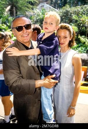 Dennis Hopper & his son attending the opening of Jurassic Park at the Universal Studios Tour in 1996 Credit: Ron Wolfson  / MediaPunch Stock Photo