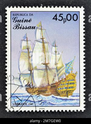 Cancelled postage stamp printed by Guinea Bissau, that shows Soleil Royal sailing ship, 17th century, circa 1985. Stock Photo