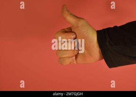 hand showing thumb up (like) Stock Photo