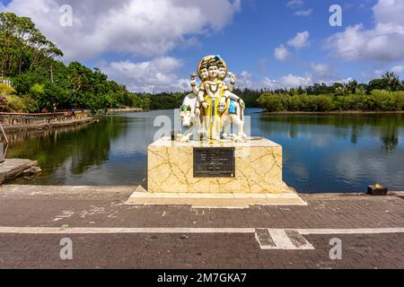 Grand Bassin Lake, Mauritius, December 2021 - Statue of Hindu mythology divinity at the sacred Ganga Talao lake Stock Photo