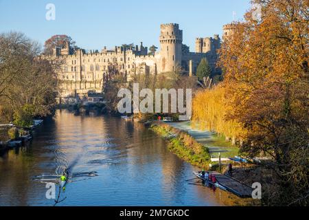 The river Avon as it passes below Warwick castle in the Warwickshire town of Warwick,after a light winter snow fall Stock Photo