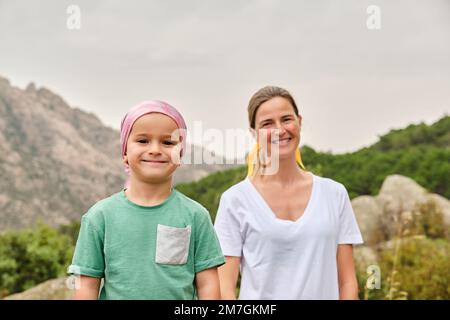 Portrait of a child with cancer in nature. Stock Photo