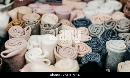 Abstract background of fabric samples, colorful background, selective focus. Sewing clothes, accessories shop, hobby and haberdashery Stock Photo