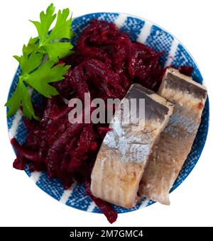 Sliced herring with grated beetroot Stock Photo