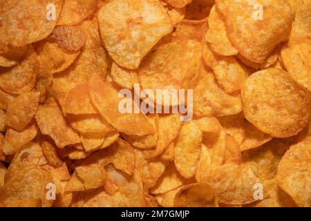 tasty crispy potato chips background Stock Photo
