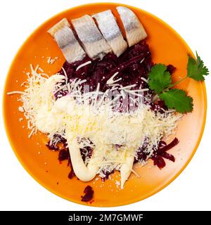 Beetroot served with cheese and pickled mackerel Stock Photo