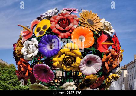 Lyon: Colourful tree statue of flowers by Korean artist Choi Jeong Hwa and fountain in Antonin Poncet Square, Lyon, France Stock Photo