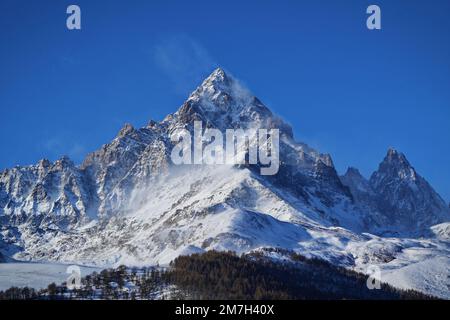 Monviso, 3,842 meters, is the king of the Alps, imposing and majestic in its snowy beauty. A breathtaking view from the village of Ostana in Piedmont, Stock Photo