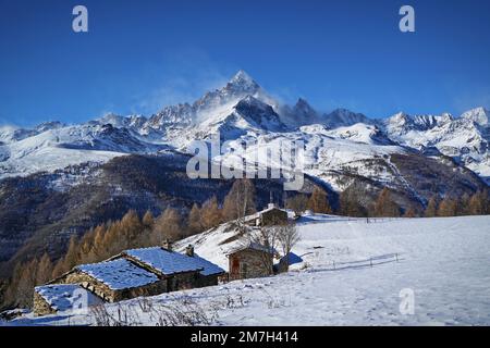 Monviso, 3,842 meters, is the king of the Alps, imposing and majestic in its snowy beauty. A breathtaking view from the village of Ostana in Piedmont, Stock Photo