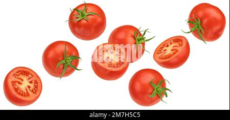 Falling cherry tomatoes isolated on white background Stock Photo