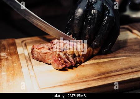 Excellent cuts of Argentine meat on wooden board Stock Photo