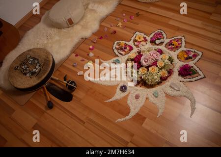 Spiritual altar, natural stones, shamanism ceremony, yoga,  flower Stock Photo
