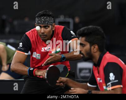 Doha, Qatar. 9th Jan, 2023. Sharath Kamal Achanta (L)/Sathiyan Gnanasekaran of India compete against Ma Long/Yuan Licen of China during the men's doubles round of 16 match of World Table Tennis Championships (WTTC) Asian Continental Stage in Doha, Qatar, Jan. 9, 2023. Credit: Nikku/Xinhua/Alamy Live News Stock Photo