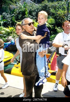 Dennis Hopper & his son attending the opening of Jurassic Park at the Universal Studios Tour in 1996 Credit: Ron Wolfson  / MediaPunch Stock Photo