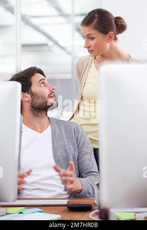 Collaborating with my colleague. a businessman explaining something to his clleague. Stock Photo