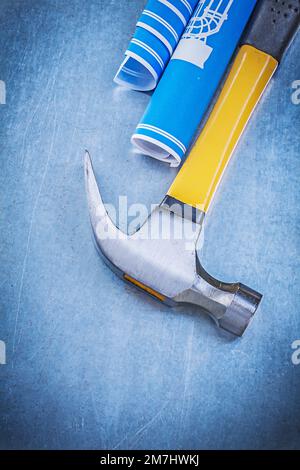 Blue engineering drawings claw hammer on metallic background ...