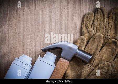Blueprint rolls claw hammer safety gloves wooden meter steel nails and ...