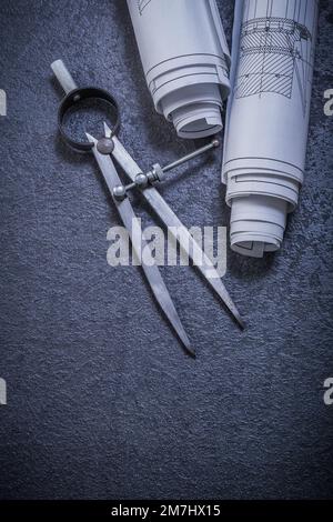 Blueprints divider on black background construction concept. Stock Photo