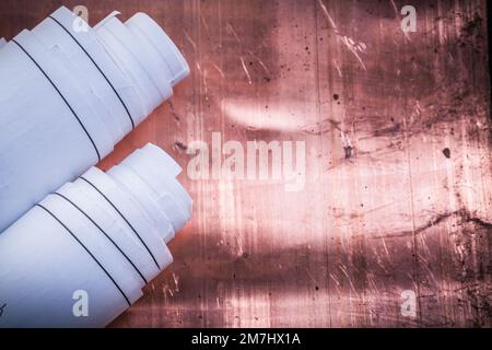 Blueprints on coppery background construction concept. Stock Photo