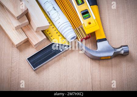 Close up of house-improvement building tools on wooden board construction concept. Stock Photo