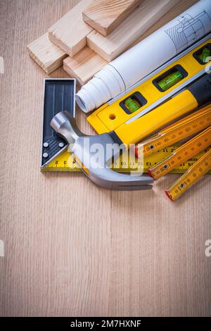 Composition of construction working tools on wooden board building and architecture concept. Stock Photo