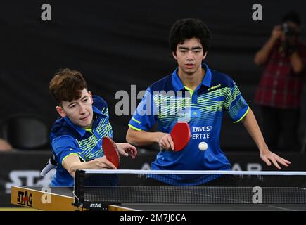 Doha, Qatar. 9th Jan, 2023. Aidos Kenzhigulov (L)/Iskender Kharki of Kazakhstan compete against Harimoto Tomokazu/Shinozuka Hiroto of Japan during the men's doubles round of 16 match of World Table Tennis Championships (WTTC) Asian Continental Stage in Doha, Qatar, Jan. 9, 2023. Credit: Nikku/Xinhua/Alamy Live News Stock Photo