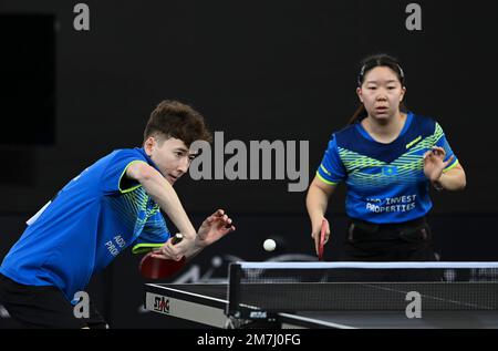 Doha, Qatar. 9th Jan, 2023. Aidos Kenzhigulov (L)/Zauresh Akasheva of Kazakhstan compete against Harimoto Tomokazu/Hayata Hina of Japan during the mixed doubles round of 16 match of World Table Tennis Championships (WTTC) Asian Continental Stage in Doha, Qatar, Jan. 9, 2023. Credit: Nikku/Xinhua/Alamy Live News Stock Photo